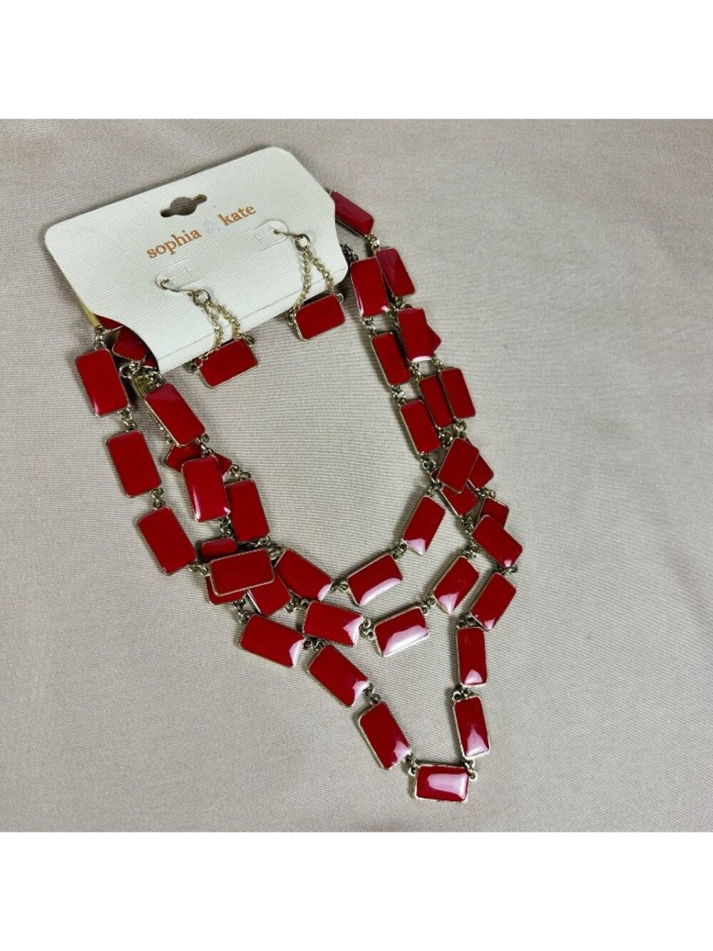 Sophie & Kate red enamel necklace, new in original packaging. Gold Tone. A102